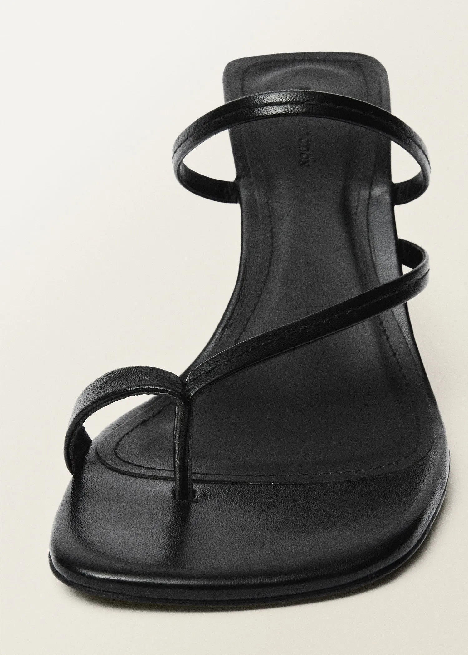 Heeled leather sandals with straps
