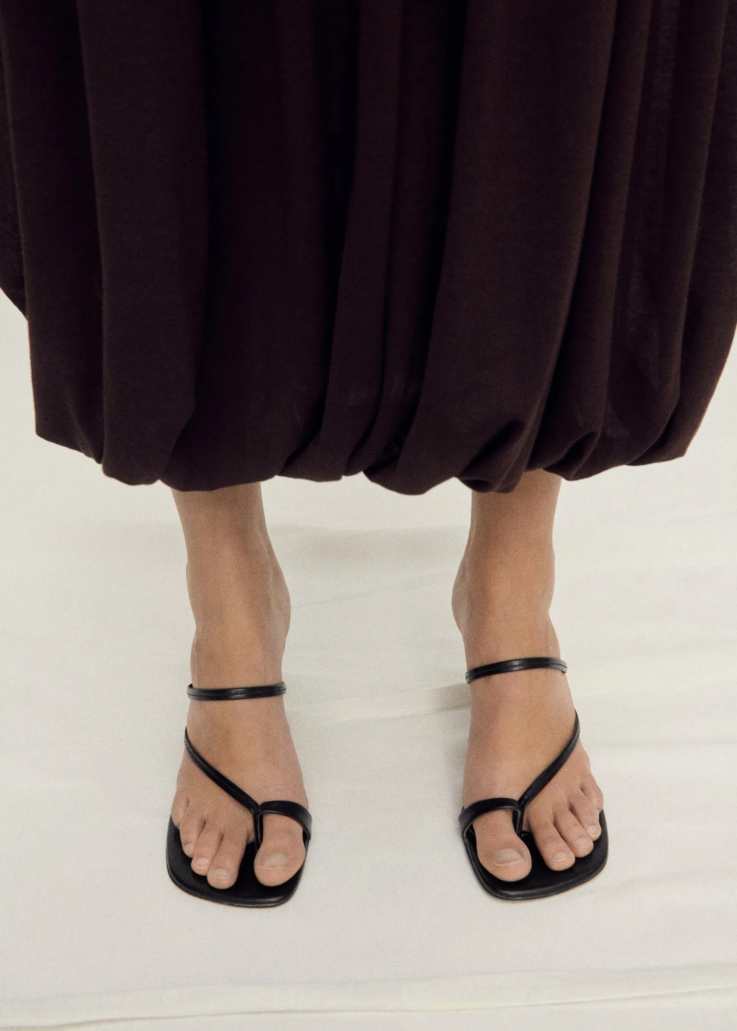 Heeled leather sandals with straps