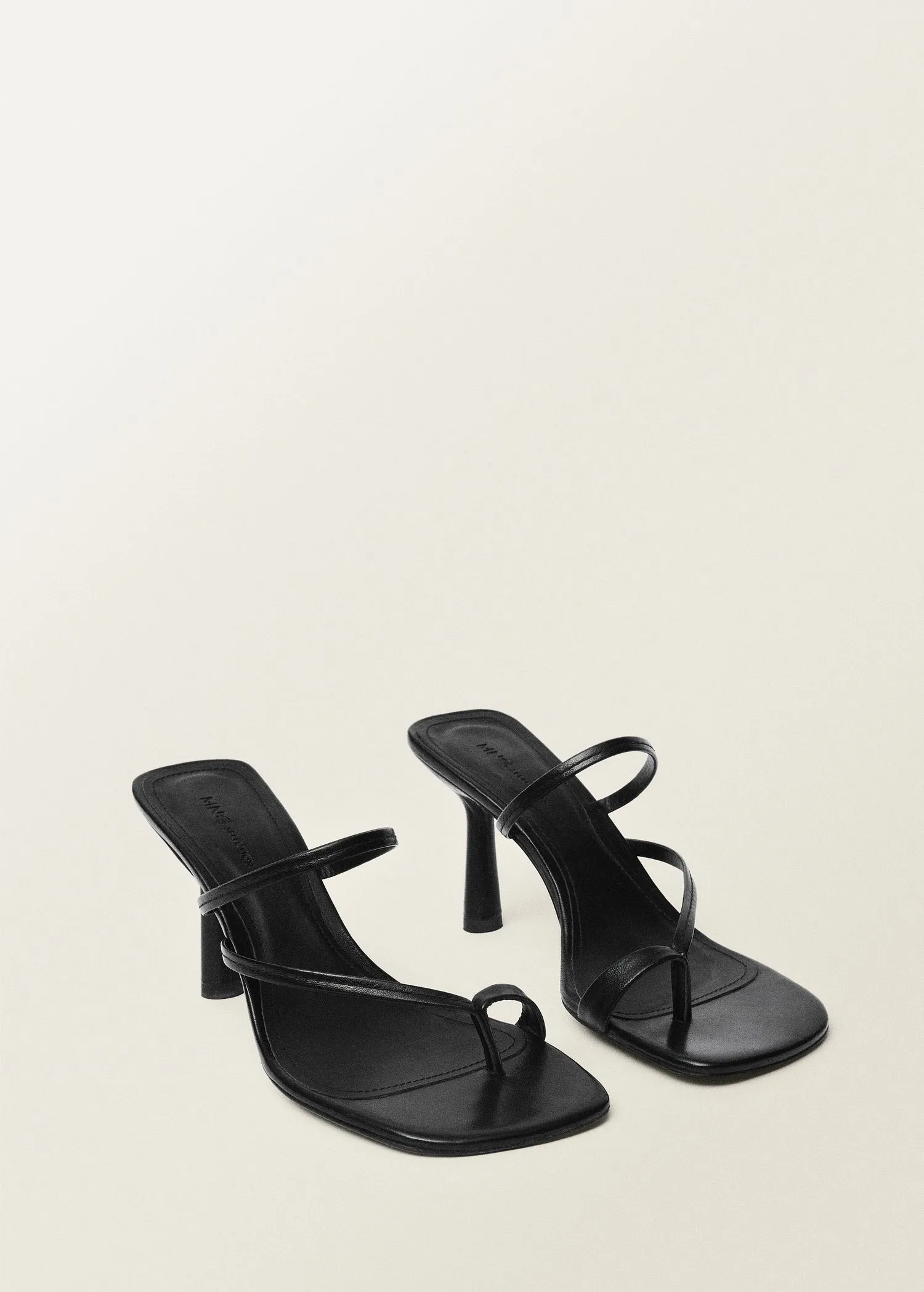 Heeled leather sandals with straps